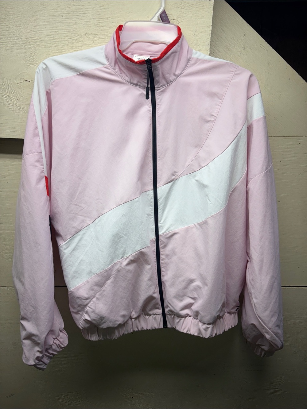 Reebok Pale Pink Bomber Jacket with White Diagonal Stripe